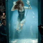 Durante uma das cenas mais desafiadoras, a personagem de Isla Fisher precisa ficar submersa durante um dos truques mais elaborados do grupo de mágicos do filme. (Foto: Divulgação)